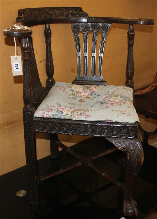 George III and later carved oak corner chair(-)
